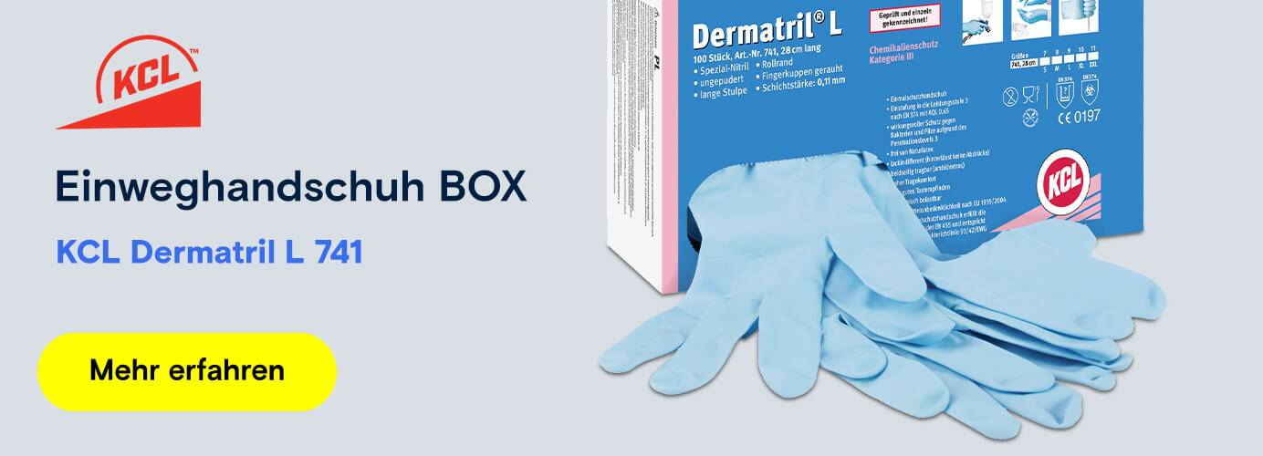 Box mit KCL Dermatril L 741 Einweghandschuhen, blau, auf einer hellen Oberfläche ausgebreitet.