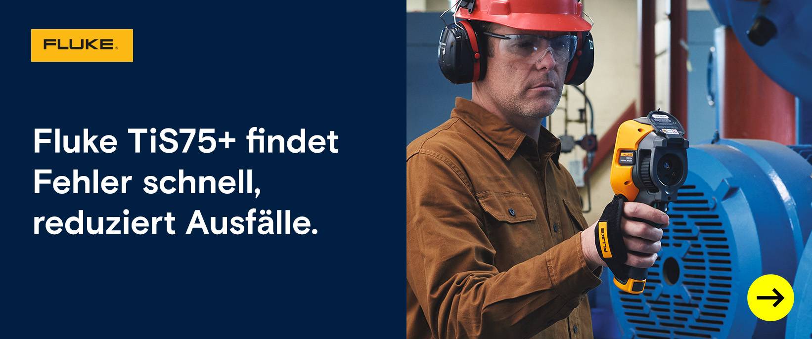 Fluke: Handwerker prüft eine Maschine mit Wärmebildkamera.