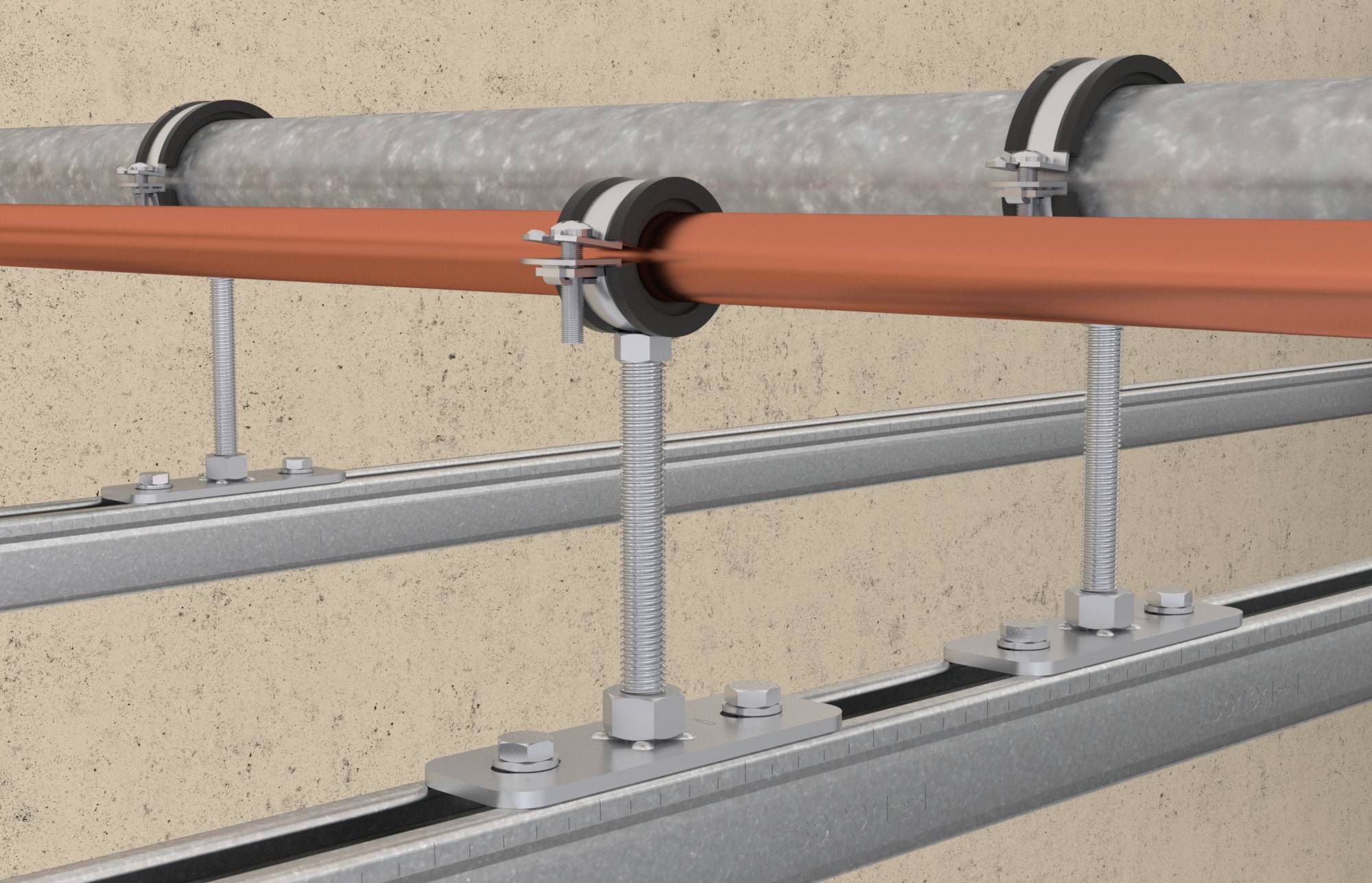 Dvě trubky jsou namontovány rovnoběžně na stěně pomocí kovových úchytů. Jedna z trubek je stříbrná, druhá oranžová.