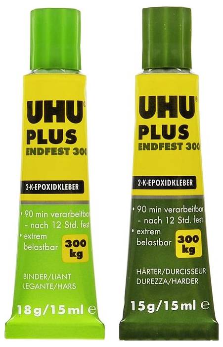 Dvě tuby UHU Plus Endfest 300, dvousložkový epoxidový lepidlo. Jedna zelená, jedna žlutá tuba. Vhodné pro extrémně pevné spoje.