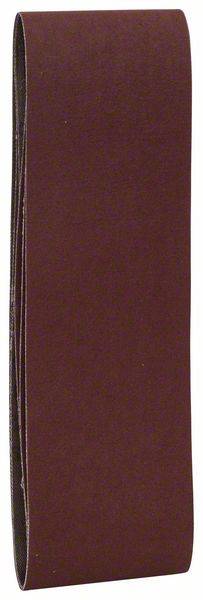 Hnědý brusný pás stojící vzpřímeně před neutrálním pozadím.