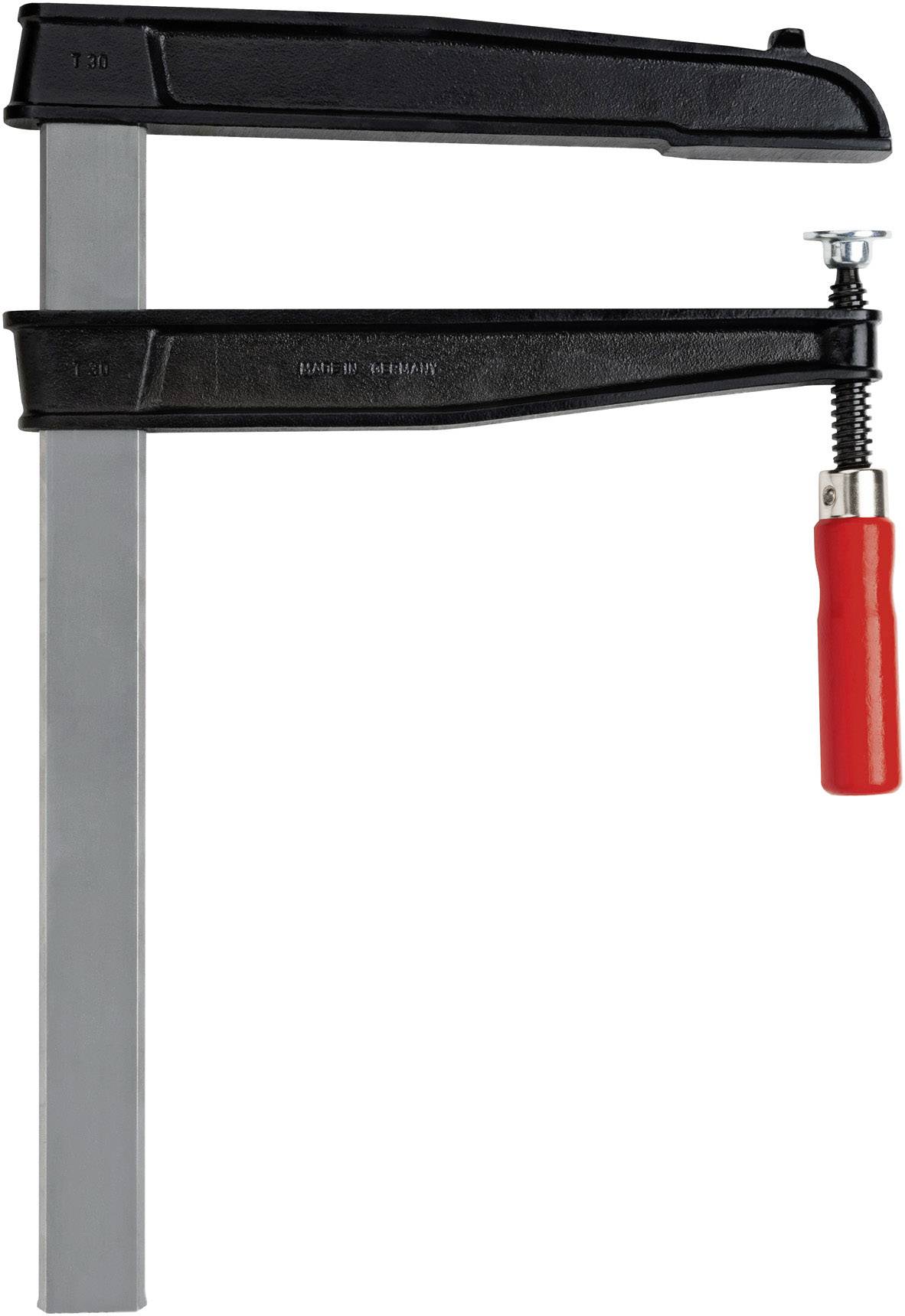 Kovová svorka s červeným držadlem, používaná k upevnění materiálů při řemeslných pracích.