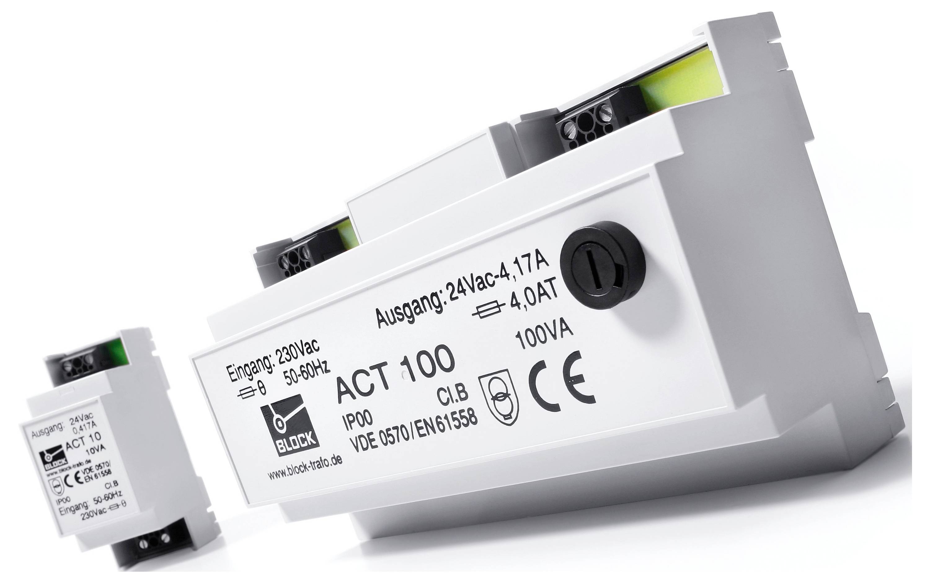 Elektronická komponenta bloku s nápisem 'ACT 100', vstupní napětí 230VAC, výstupní napětí 24VAC.