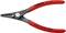 Červeno-černé kleště na pojistné kroužky značky Knipex, model 4911A1, pro vnitřní kroužky o průměru 10 až 25 mm.