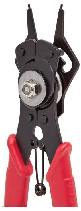 Kleště na pojistné kroužky s červenými rukojeťmi, určené pro demontáž nebo montáž pojistných kroužků v mechanických součástech.