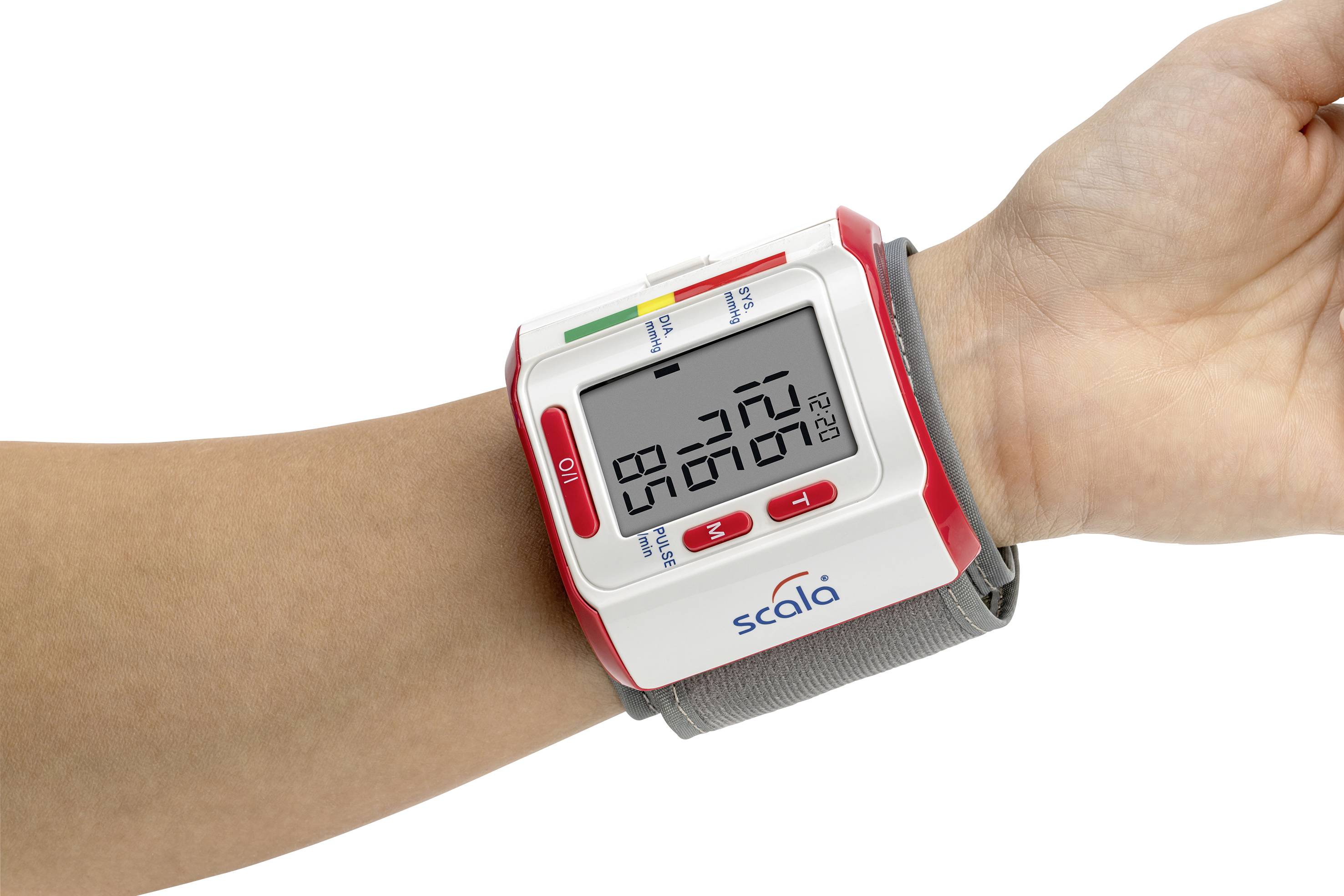 Přístroj na měření krevního tlaku na zápěstí ukazuje krevní tlak 127 na 80 mmHg a tepovou frekvenci 78. Přístroj má digitální displej.
