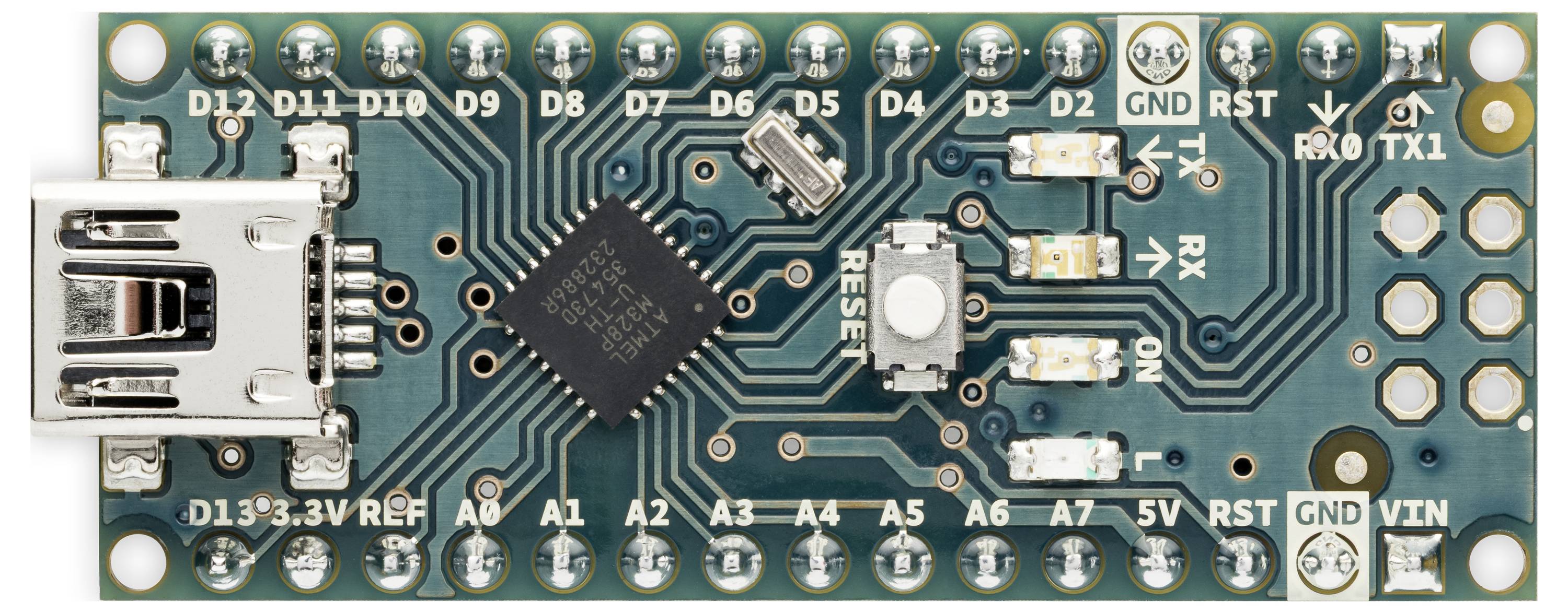 Arduino Nano-style deska mikrokontroléru s USB portem a kolíky s popisky D13, D12, D11, D10, D9, D8, D7, D6, D5, D4, D3, D2, GND, RST, RX, TX, A0-A7, 5V, VIN.