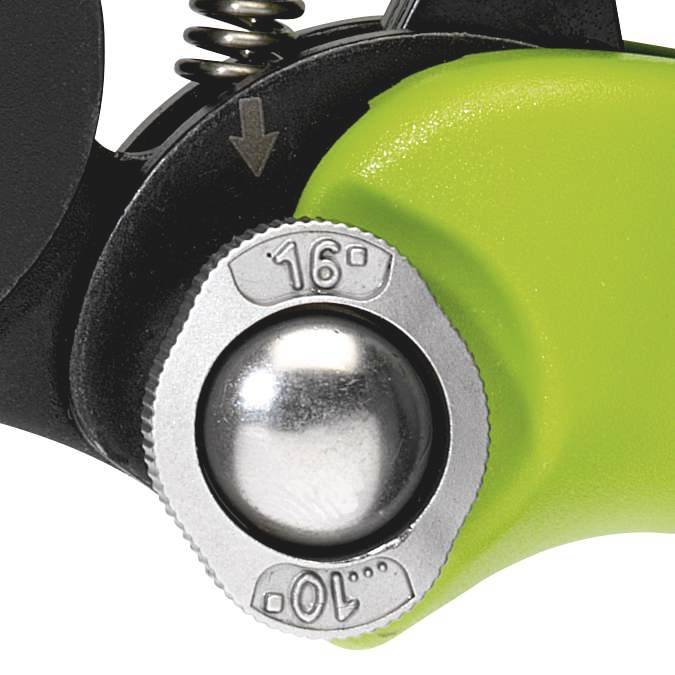 Detailní záběr zeleno-černého mechanismu s račnou s označením '10° 16°' na kovovém kotouči.