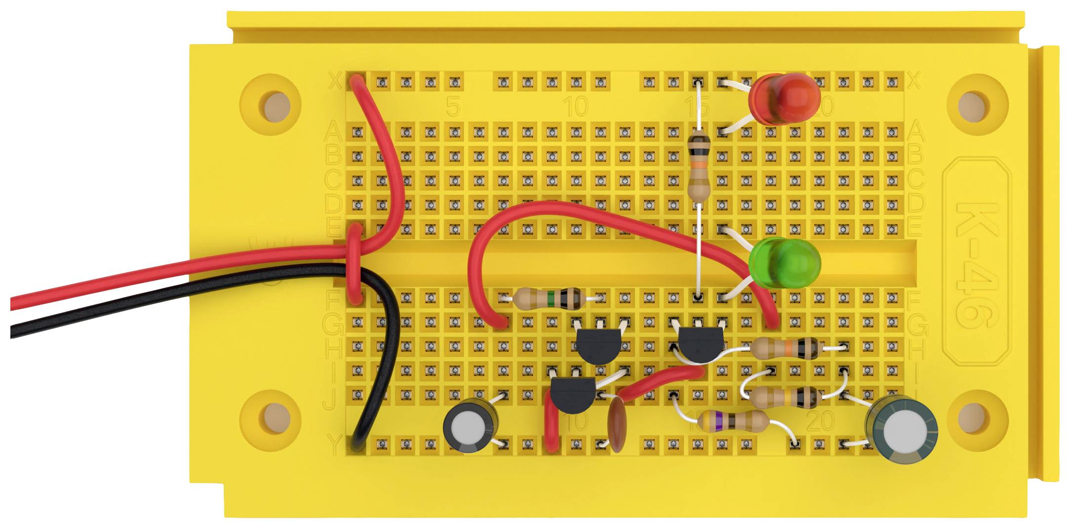 Žlutá nepájivá kontaktní deska s obvody, červenými a zelenými LED diodami, vodiči a rezistory ukazuje základní elektronickou strukturu.