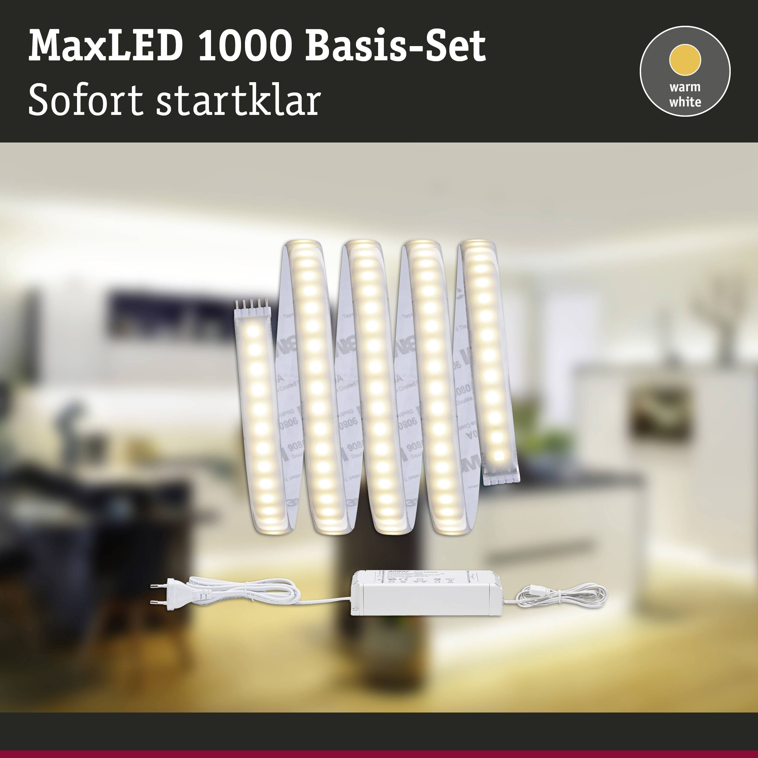 MaxLED 1000 základní sada: Obrázek ukazuje energeticky úsporné LED pásky v teplém bílém světle s napájecím zdrojem, vhodné pro osvětlení interiérů.