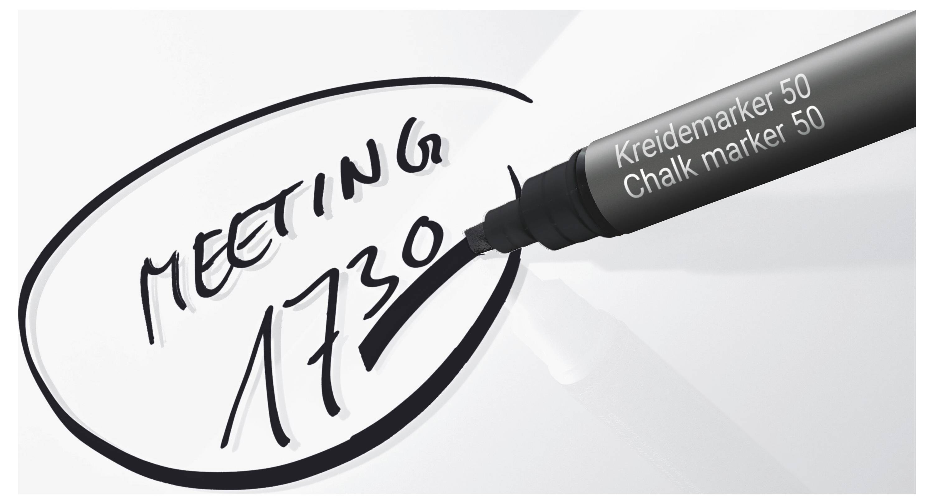 Černý tužkový značkovač s nápisem „MEETING 1730" uvnitř ručně nakreslené elipsy na bílém povrchu.