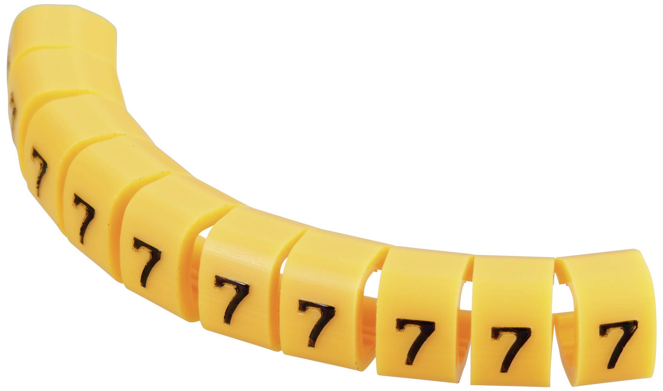 Žluté kabelové značení s číslem '7', umístěné v ohnutém uspořádání.