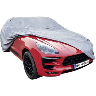 Červené auto, částečně zakryté šedým krytem, stojí zaparkované. Registrační značka ukazuje 'HM HP 8888'.