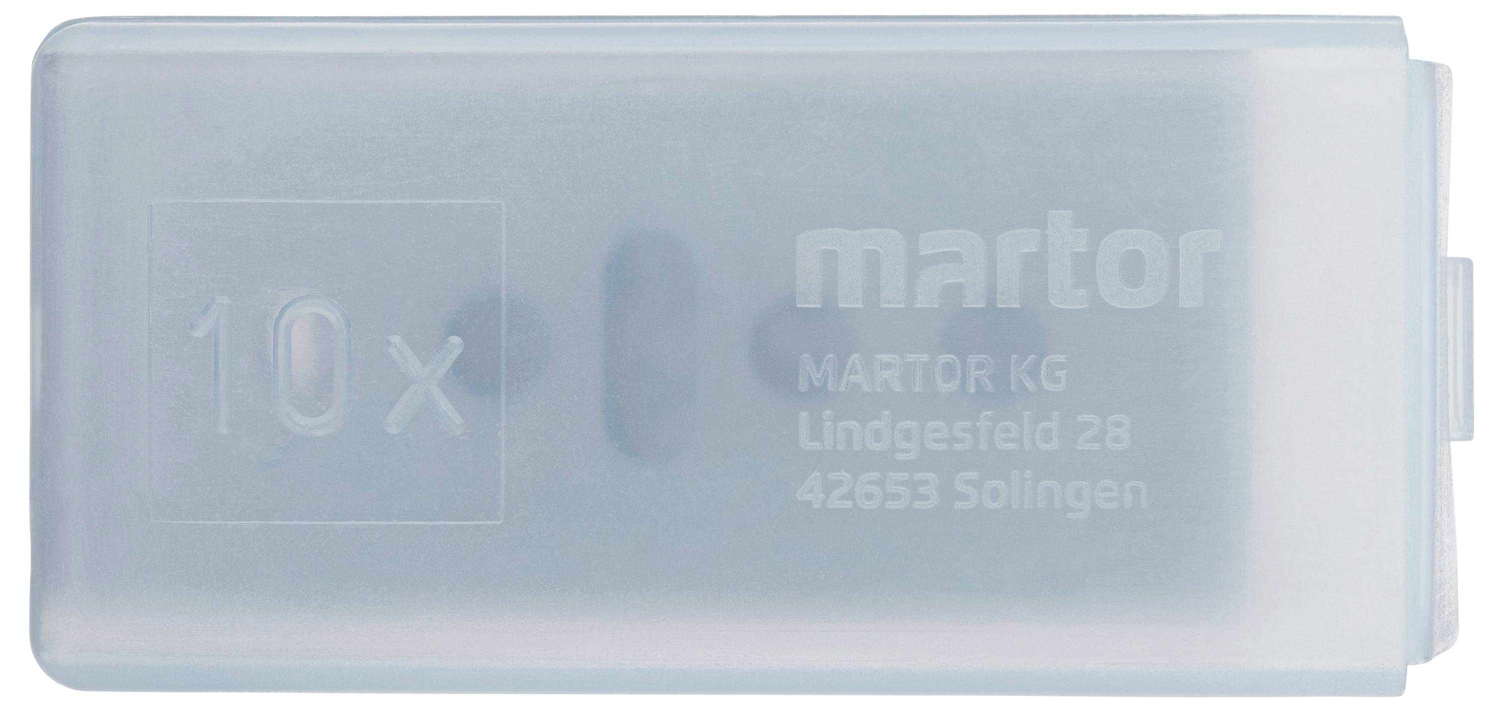 Průhledná plastová krabička s nápisem 'martor', obsahuje 10 čepelí. Adresa 'MARTOR KG, Lindgesfeld 28, 42653 Solingen'.