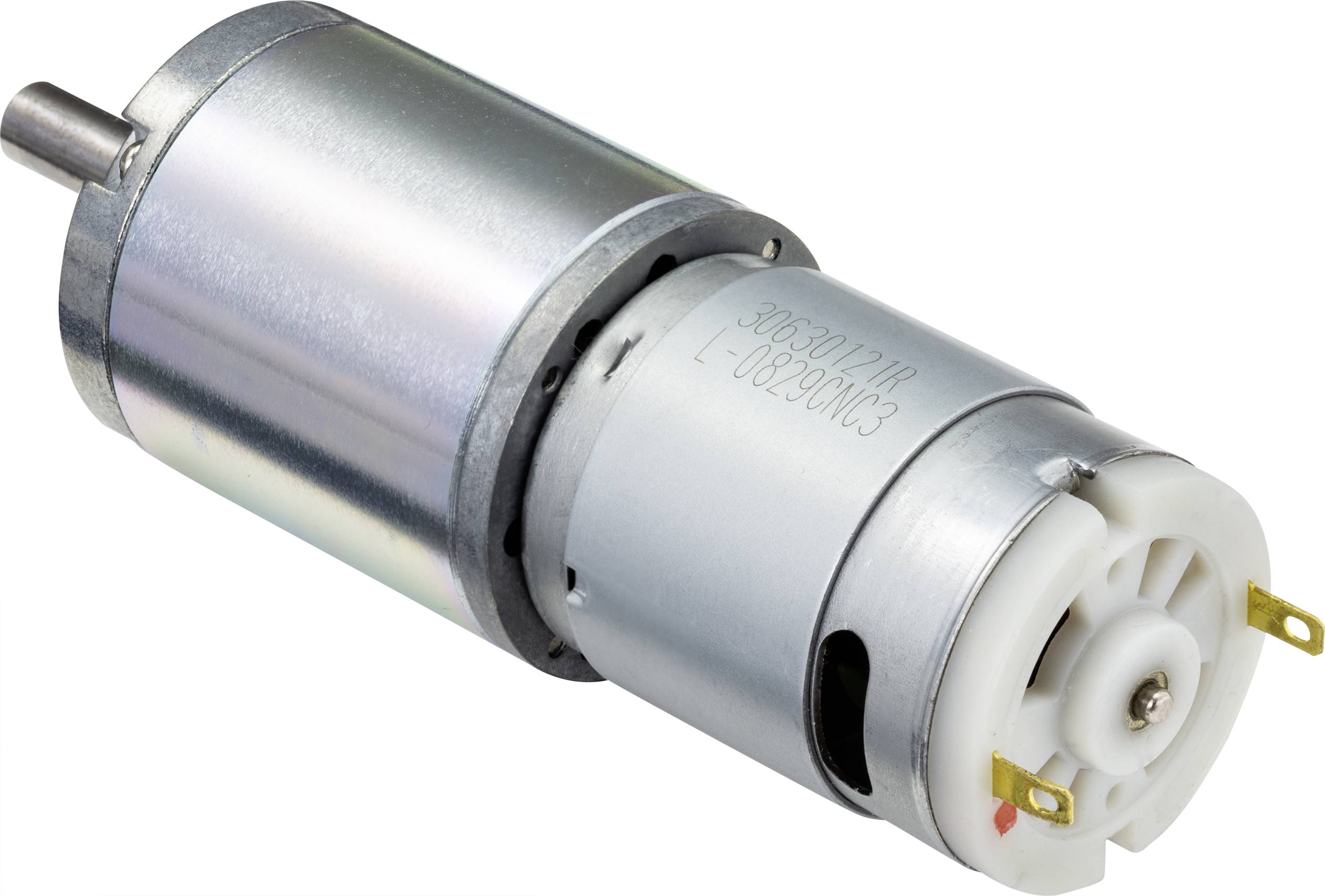Malý elektromotor s válcovým kovovým tělem ukazuje hřídel a připojovací svorky.