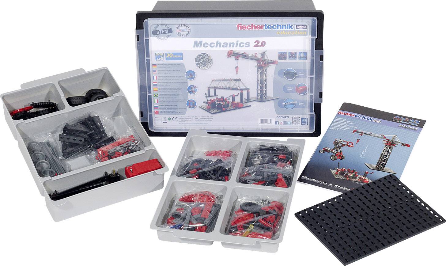 Stavebnice Fischertechnik Mechanics 2.0 s díly, návodem a úložným boxem. Obsahuje ozubená kola, kola a konstrukční prvky.