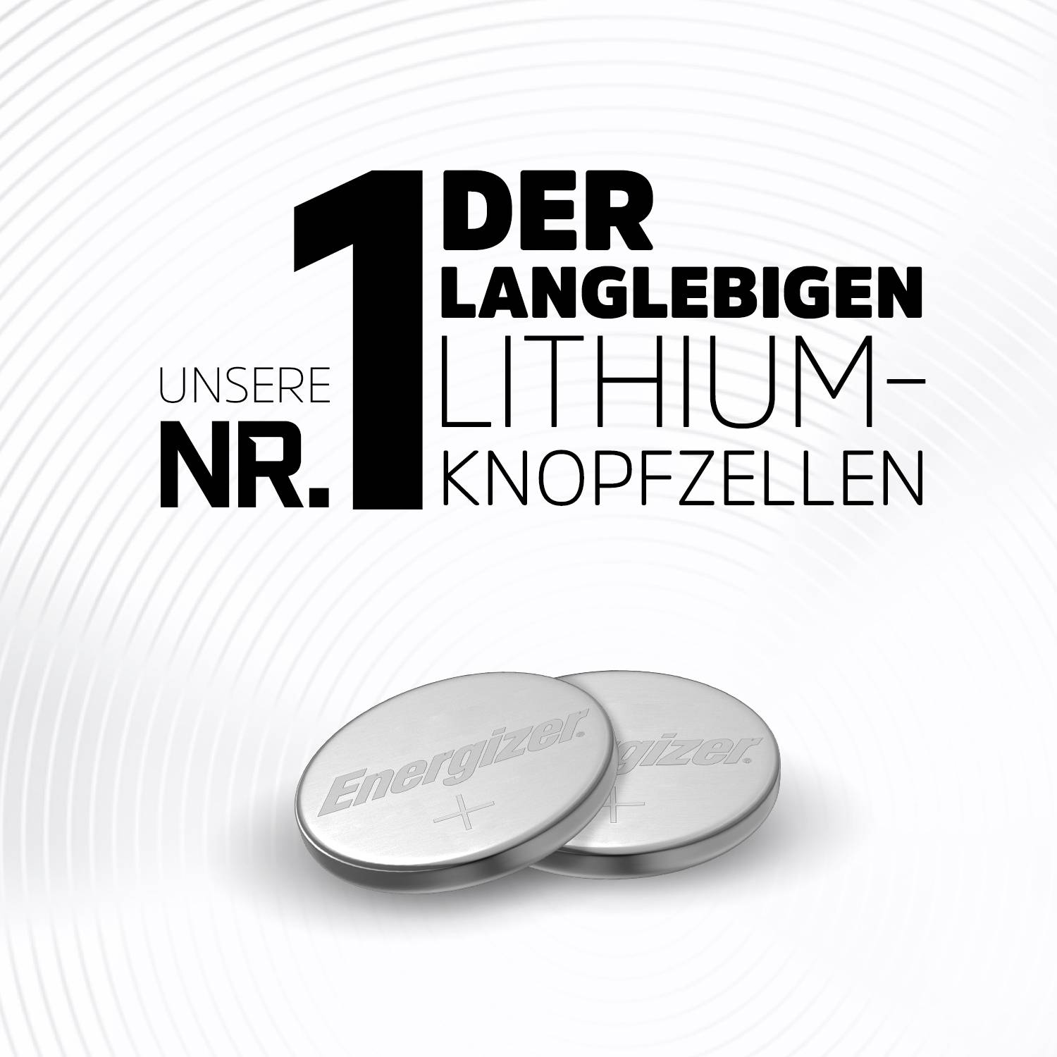Dvě baterie Energizer leží na sobě. Text: 'Naše č. 1 mezi dlouhověkými lithiovými knoflíkovými bateriemi'.