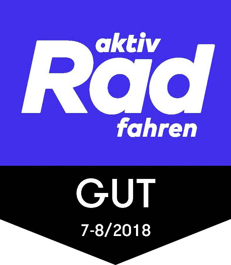 Modré a černé označení, zobrazuje nápis 'aktivní jízda na kole' v bílé barvě a 'GUT 7-8/2018' dole. Hodnotitelské logo v cyklistickém magazínu.