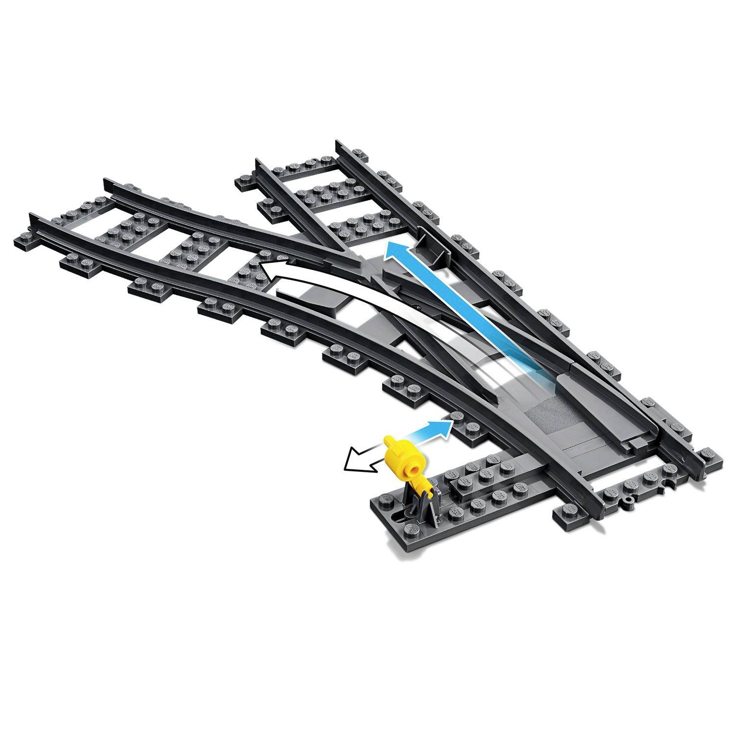 Dvoukolejová železniční výhybka z LEGO stavebnice vyrobená z černého plastu, s žlutým přepínačem pro změnu směru kolejí.