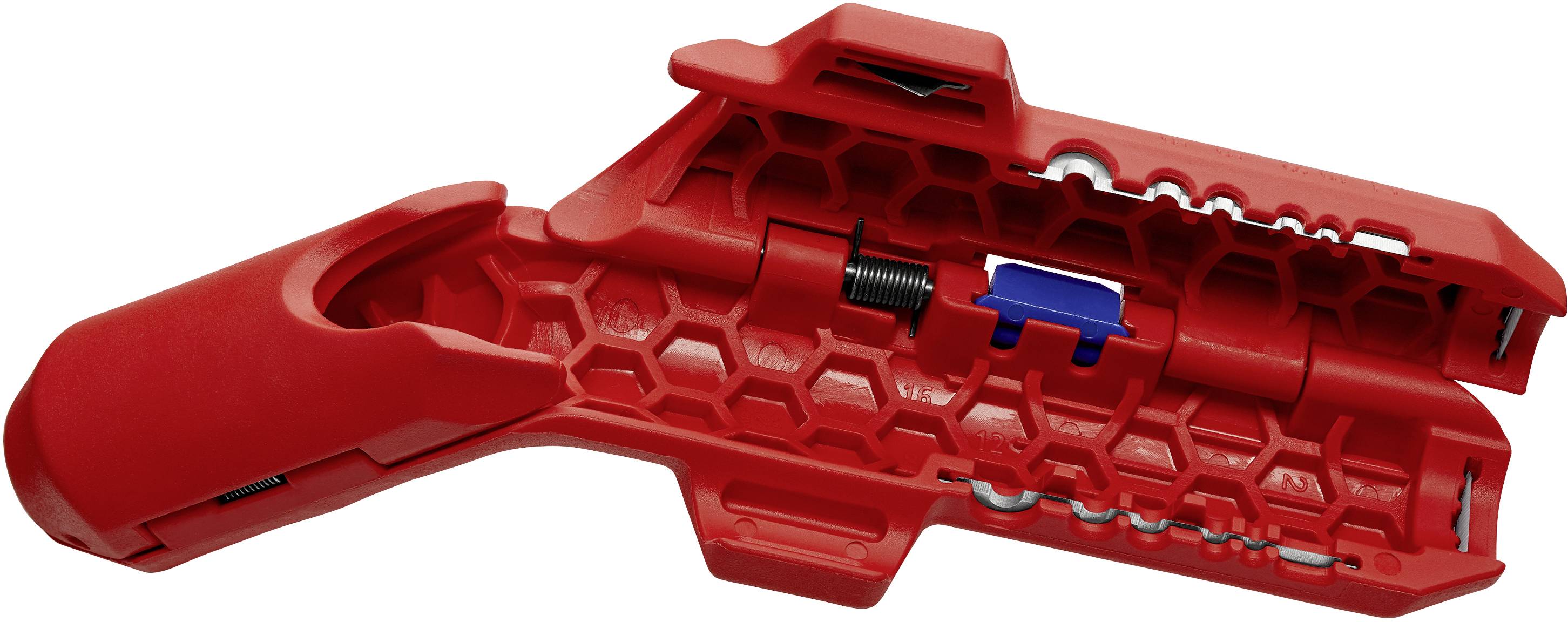 Pohled na červený plastový nástroj, který je rozdělen na dvě poloviny a odhaluje jeho vnitřní mechanismus sestávající z pružin a svorek.