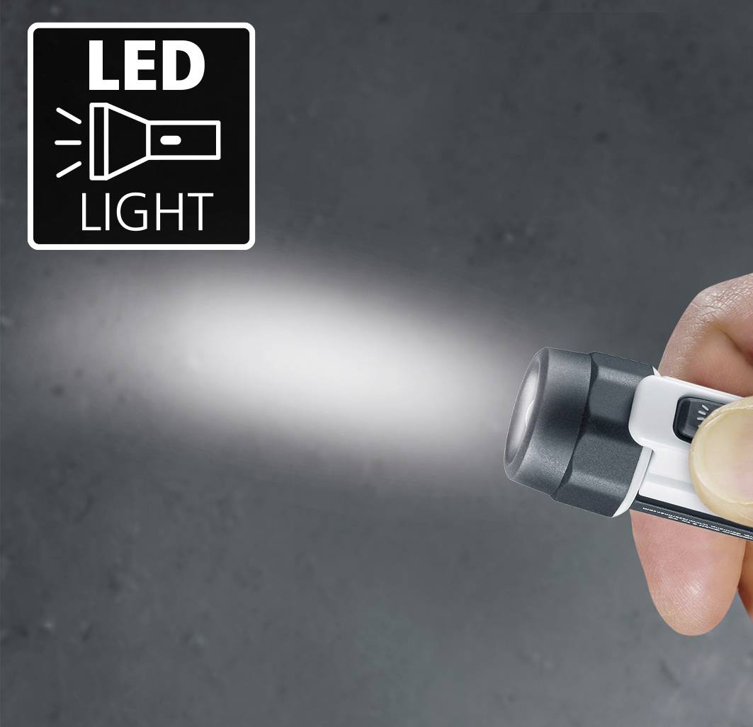 Osoba drží malou kapesní svítilnu, která osvětluje LED světlem tmavý povrch. V rohu je nápis 'LED LIGHT'.