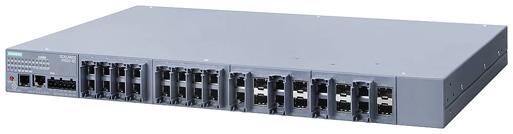 Šedý ethernetový switch s několika porty pro připojení síťových kabelů, vhodný pro použití v serverových nebo síťových rozvaděčích.