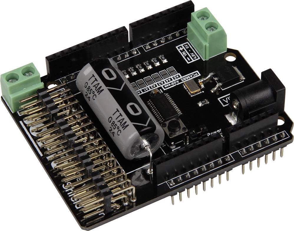 Černá rozšiřující deska pro Arduino s zelenými konektory a několika svorkami. Slouží k rozšíření obvodů.