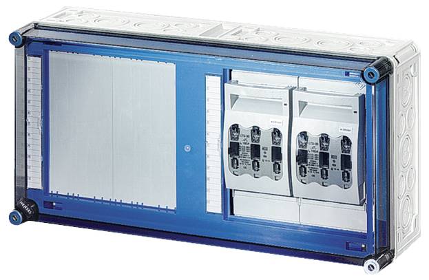 Elektrický rozvaděč s několika pojistkovými místy, vlevo volný prostor pro spínače; modro-bílý rámeček, obdélníkový tvar.