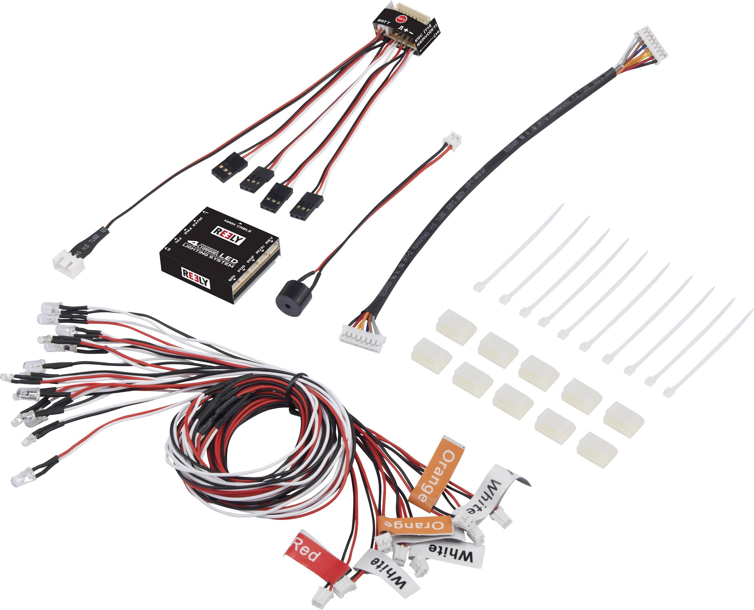 Sada LED osvětlení pro RC auta s různými kabely, konektory, LED světly, stahovacími páskami a barevnými samolepkami.