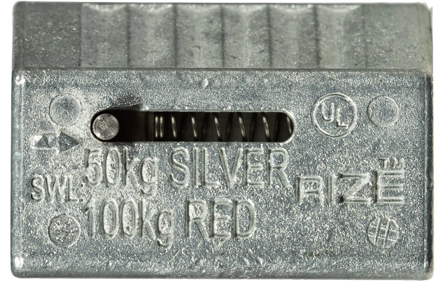 Kovový váhový blok označený '50kg STŘÍBRO' a '100kg ČERVENÁ' se středovým posuvným oknem a značkou UL.