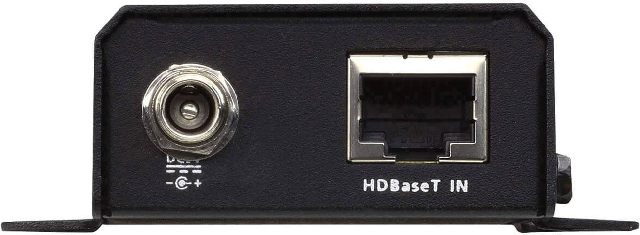 Černé zařízení s koaxiálním konektorem vlevo a konektorem HDBaseT-IN vpravo.