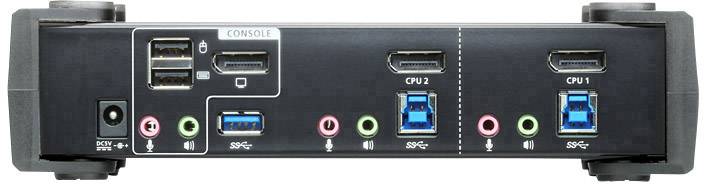 Zadní strana elektronického zařízení s několika USB porty, audio konektory, HDMI vstupy a napájecí zásuvkou.