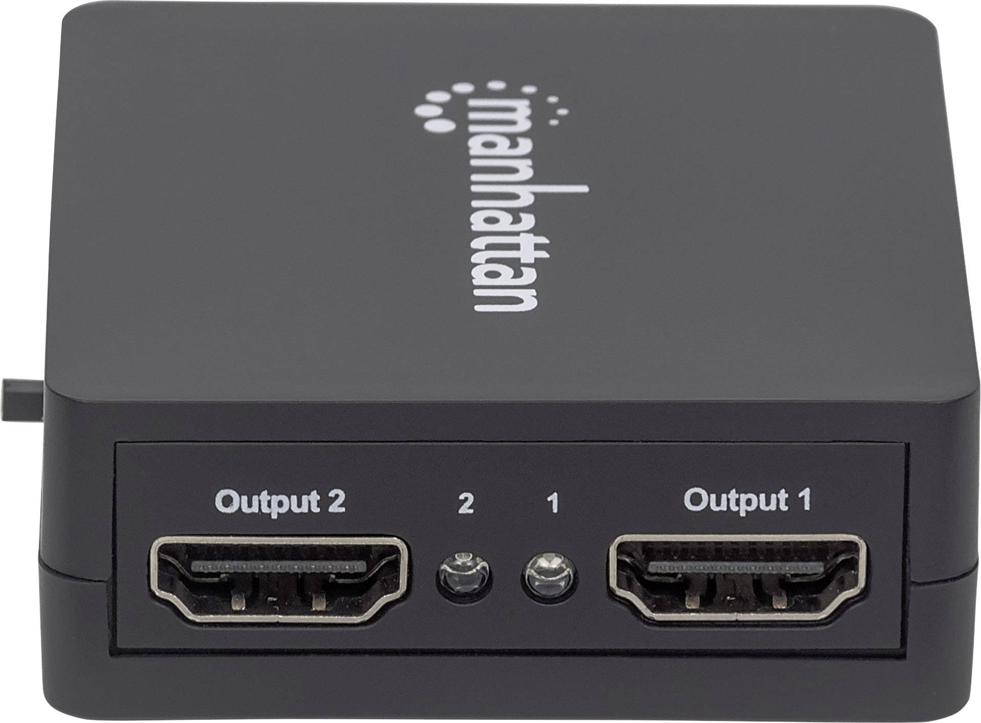 Černý HDMI rozbočovač s nápisem „manhattan". Dva HDMI výstupy jsou označeny jako „Výstup 1" a „Výstup 2".