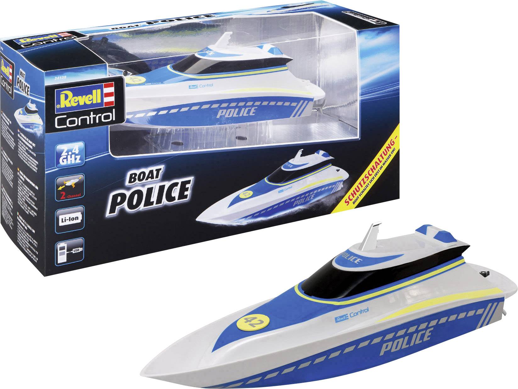 Model modrého policejního člunu v krabici s nápisem 'Revell Control'. Člun má bílé detaily a žluté pruhy.
