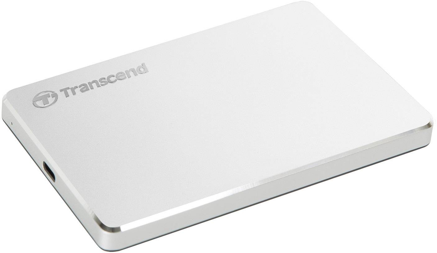Stříbrný externí pevný disk od Transcendu s elegantním designem a USB konektorem na boku.