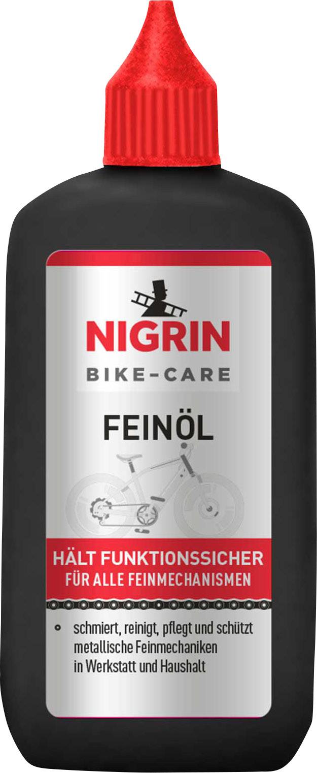 Černá láhev Nigrin Bike-Care jemného oleje. Červený uzávěr. Text: Udržuje spolehlivý chod pro všechny jemné mechanismy.