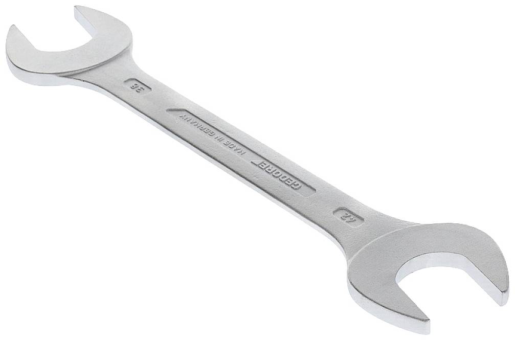 Stříbrný oboustranný klíč s rozměry 19 mm a 22 mm na každé straně, umístěný na bílém pozadí.