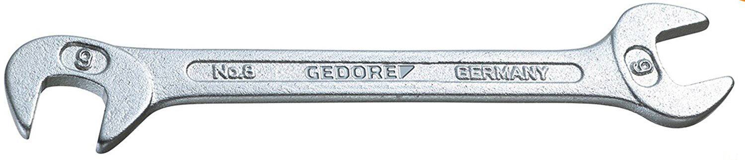 Stříbrný nástavcový klíč s otevřenou čelistí a kroužkem, na rukojeti nápis 'GEDORE NO. 6 GERMANY'.