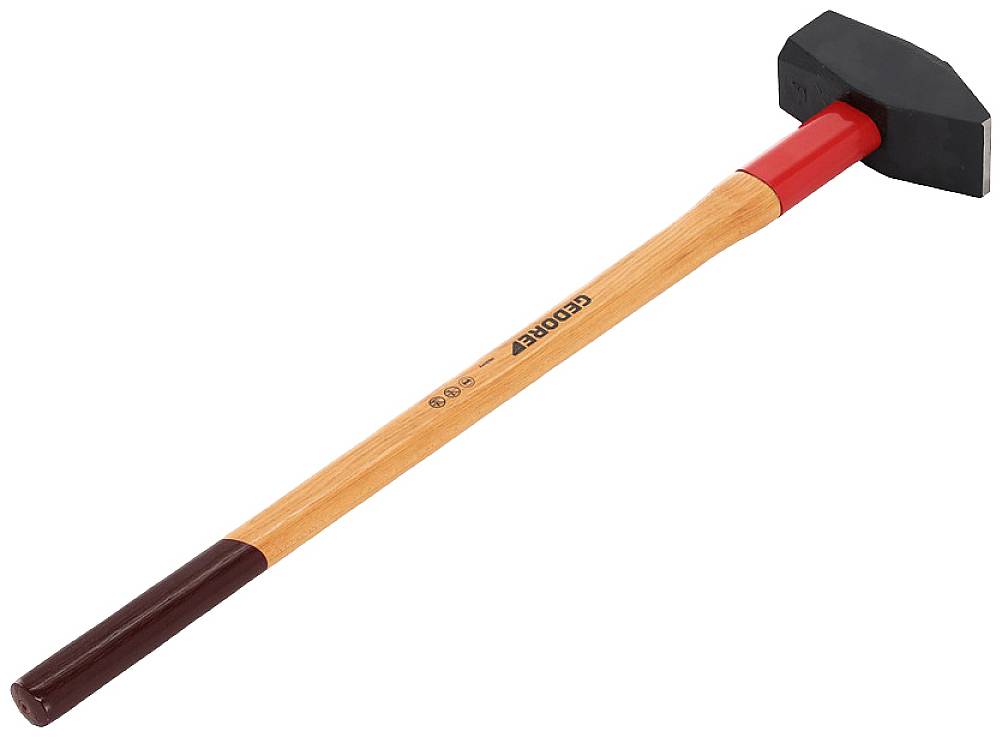 Dřevěné kladivo s červenou rukojetí a černou hlavou leží na bílém pozadí.