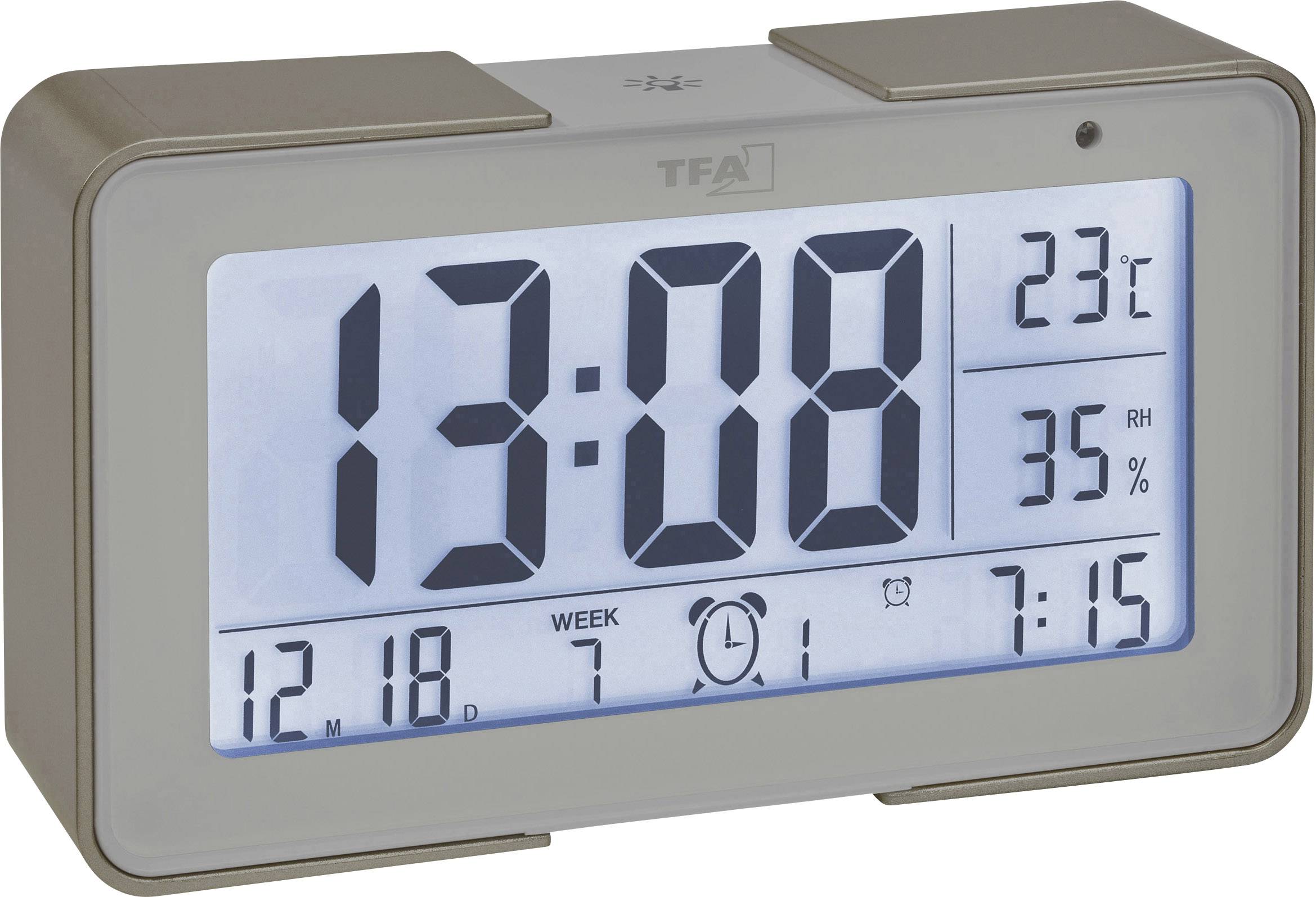 Digitální hodiny ukazují 13:08; Teplota: 23°C; Vlhkost vzduchu: 35%; Datum: 12.18; Budík nastaven na: 7:15.