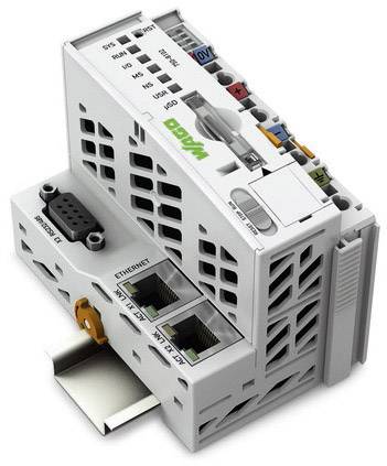 Průmyslová řídicí jednotka namontovaná na DIN liště s ethernetovými porty, připojovacími svorkami a větracími otvory.