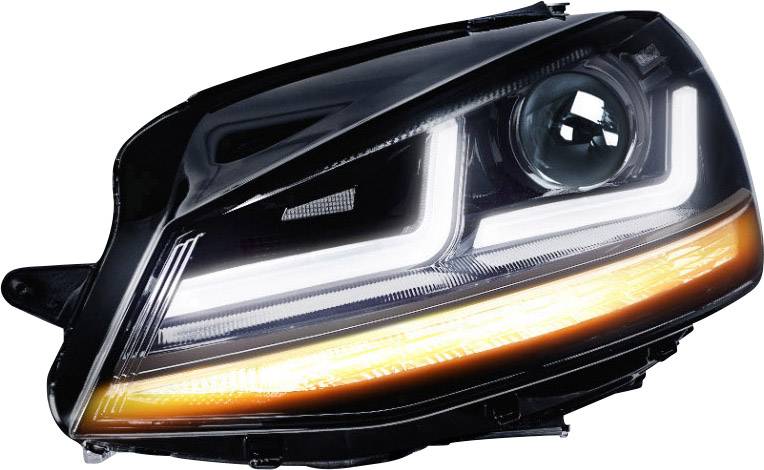 Detailní záběr moderního automobilového světlometu s LED páskem a žlutým pruhem blinkru.