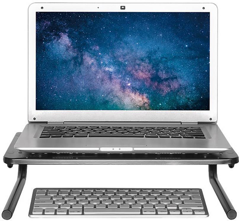 Notebook s obrázkem hvězdné oblohy na obrazovce stojí na stole. Pod ním leží klávesnice.