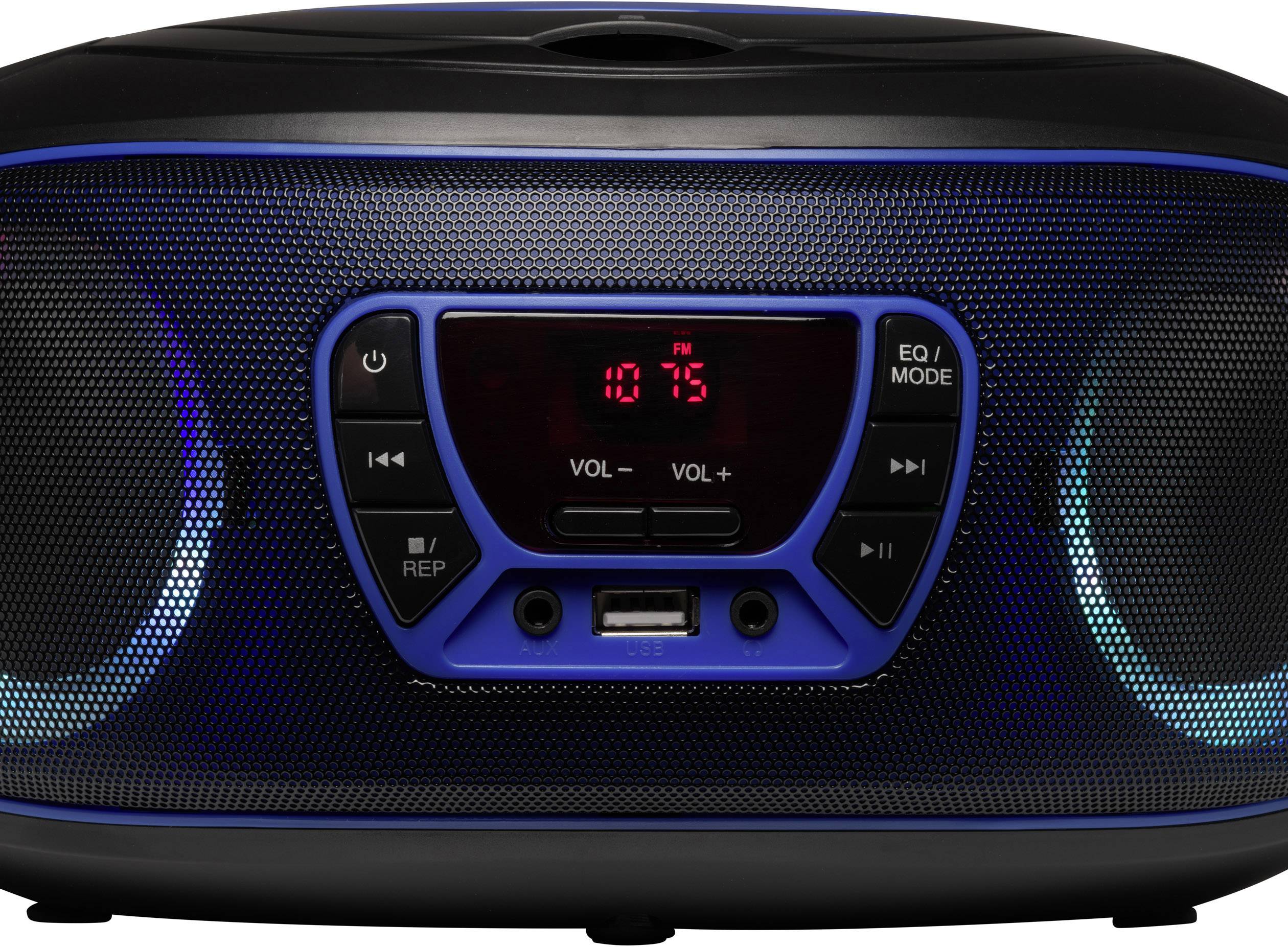 Přenosné rádio s digitálním displejem zobrazuje '10:75', obklopené tlačítky pro hlasitost, režim a ovládání přehrávání.