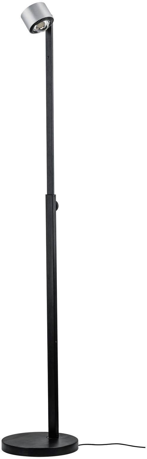 Štíhlá černá stojací lampa s kulatou podstavou a nastavitelným světelným zdrojem, s připojením kabelu, v moderním designu.
