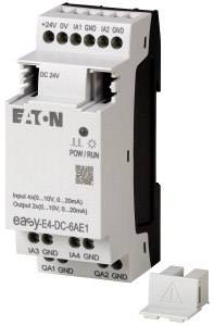 Elektronické spínací zařízení od společnosti Eaton, šedo-bílé, s několika připojovacími svorkami, označené '+24V', 'OV', 'IA1', 'IA2', 'GND' a dalšími.