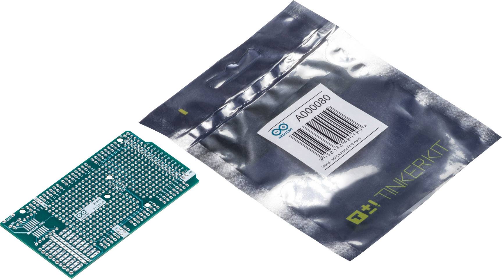Deska Arduino vedle zapečetěného sáčku s čárovým kódem.