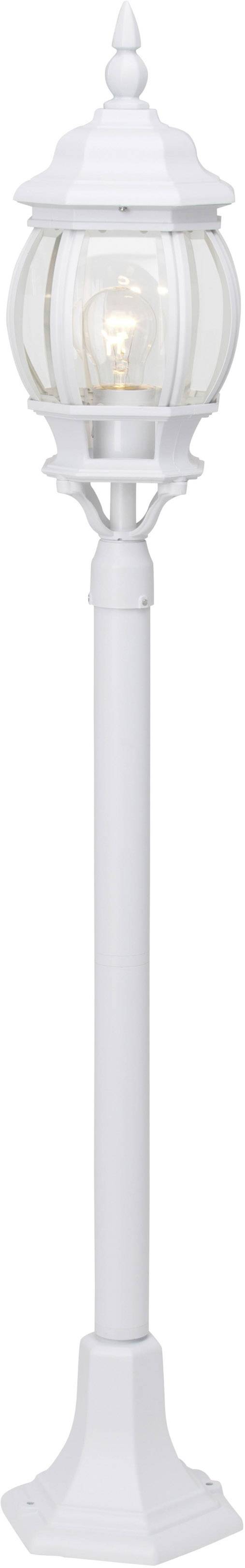 Bílá venkovní lucerna se sférickým sklem na vysokém podstavci.