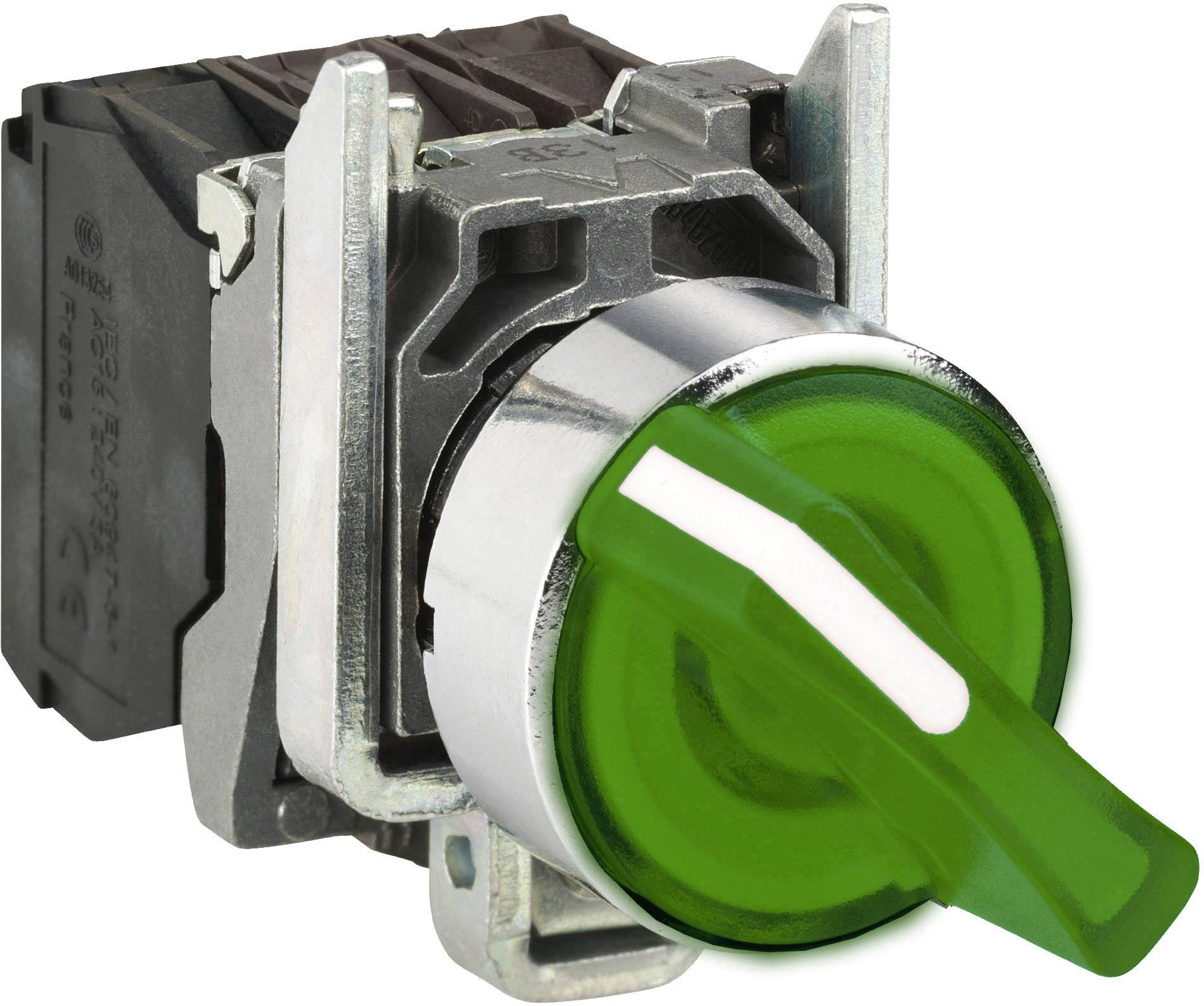 Zelený otočný přepínač se stříbrným rámečkem určený k ovládání elektrických zařízení nebo strojů.