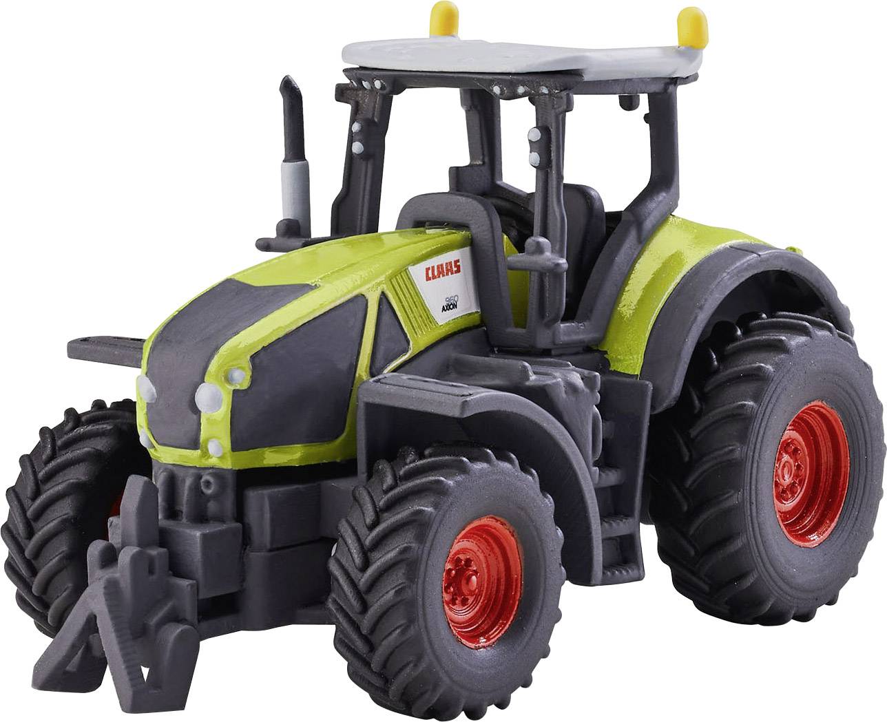 Zelený model traktoru s velkými pneumatikami a červenými ráfky. Traktor má výrazný design s žlutými detaily.